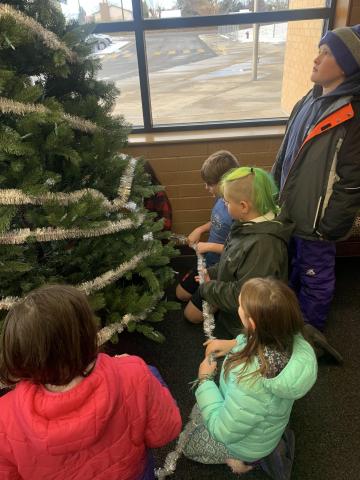 Members of our student council and student action team helped set up the Larsen Christmas tree this week.  They did a great job and now we are ready to celebrate the season.  Happy Holidays to all our amazing Larsen families!