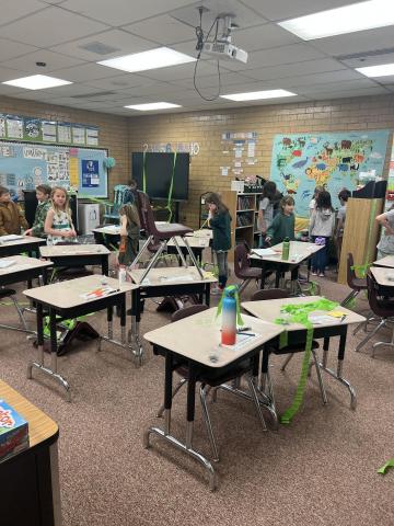 Some Leprechauns decided they wanted to cause some mischief at Larsen on St. Patrick's Day.  They messed up desks, wrote on papers, left footprints around and even tipped over some chairs.  There were a lot of traps set around classrooms but they still managed to get away.  Maybe next year we will have better luck!