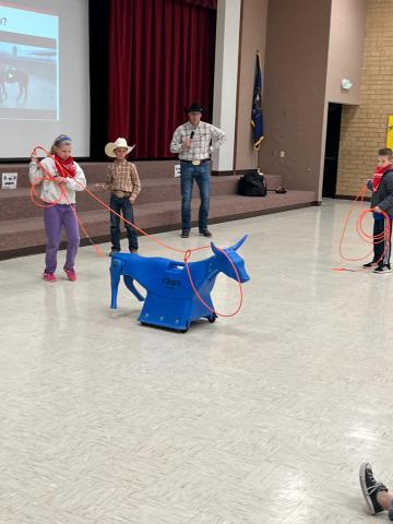 We are kicking off the month of April with the Fiesta Days Rodeo Reading Challenge. Today Larsen students learned about all the different events during a rodeo and  even got to participate in roping and barrel racing. Your child will be bringing home a calendar for them to keep track of the minutes they read.  They will be entered into a drawing for prizes at the end of the month. There is also a traveling trophy for the school that has the most minutes read. Please encourage your child to read.  Let's go L