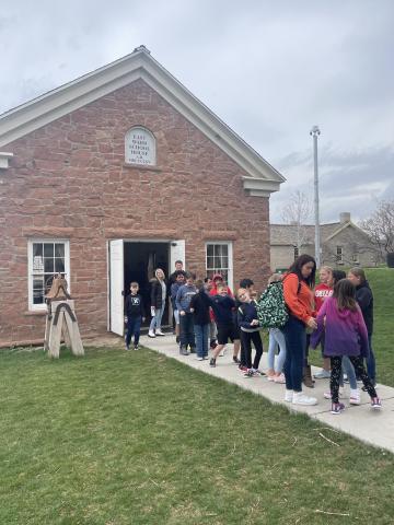 Fourth graders enjoyed their field trip at This Is The Place Heritage Park on Friday! They danced the Virginia Reel in the social hall, learned about leather-making at the saddle shop, explored the visitor center, and learned what it was like to be a student in a one-room schoolhouse. It was a blast! 