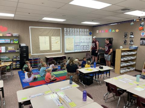 Larsen students were excited to have MMHS football players come and read in their classes today.  Three of the players were even previous Larsen Leopard students!  They read some fun stories and answered questions from the kids.  Thank you for visiting our school!