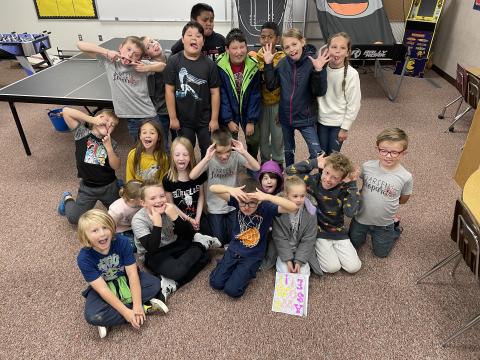 These lucky students were the 200s club board winners for the month of October. They were chosen by their teachers to earn golden tickets for awesome behavior and great attitudes!