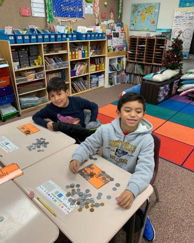 Second grade is loving learning about money! Students had to practice making different amounts using various coins.  