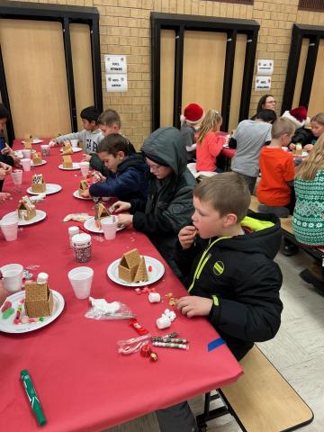 A favorite tradition in 3rd grade is making gingerbread houses each Christmas season.  Students had such a great time being creative and putting as much candy on their houses as possible.  Thank you to all our parents that came and helped with it also.  