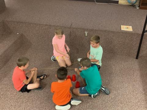 Our 2nd grade classes have been busy since starting the new school year.  They have been learning about number sense and number identification.  They have practiced being good friends and working together by building a pyramid with cups.  Then they celebrated Fun Friday by making cloud dough.  Great job 2nd graders!