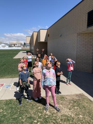 Students and staff had fun going outside with our special glasses to see the eclipse.  