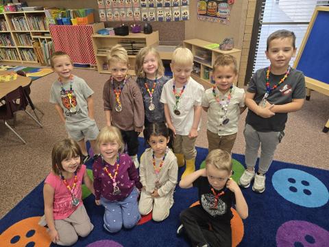 Our preschool class celebrated the first day of our spirit week by dressing up like a teacher.  Mrs. McAllister made them each a Larsen lanyard for each of them to wear.