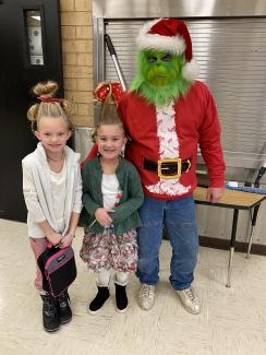 The Grinch was found working in our lunchroom today.  He even found a few people from Whoville eating lunch.  