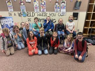 Larsen Elementary recently held White Ribbon Week.  This week was dedicated to teaching students about internet safety.  Our PTA hid clues around the school for students to find and read information about how to stay safe while online.  They also provided mustaches for each student detective.  