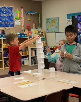 Students competed to build the tallest tower out of only 3x5 cards. It was amazing how tall they got.  They also had to work to stack cups without touching them. They could only use strings and rubber bands. 