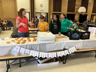 We had a great showing for our annual Parents and Pastries this morning!  Thank you to our PTA that organized it and put it all together.   They provided a book to each student to bring and donuts for all who participated.  Keep up all the good reading!