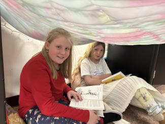 The fourth graders celebrated Read Across America with a Read-A-Thon today! We set up little campsites through our classroom, put the crackling fire on the big screen, and read the afternoon away. Students were excited all week about this fun activity, and did such a great job reading! We love books! 